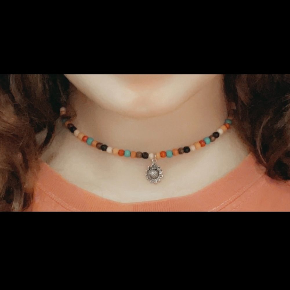 Beaded choker necklace with flower charm